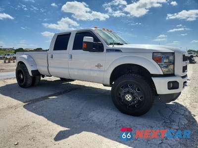 Czwarte zdjęcie samochodu z boku: 2014 FORD F350 SUPER DUTY VIN:1FT8W3DT2EEB50998 - miniatura