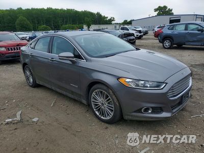 Czwarte zdjęcie samochodu z boku: 2014 FORD FUSION SE HYBRID VIN:3FA6P0LU8ER373854 - miniatura