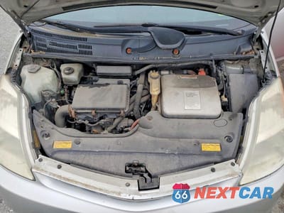 Zdjęcie 11 z 12 samochodu: 2005 TOYOTA PRIUS BASE VIN:JTDKB20UX53063355 - miniatura