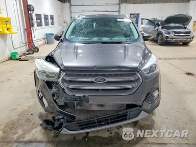 Piąte zdjęcie samochodu w środku: 2017 FORD ESCAPE TITANIUM VIN:1FMCU0J91HUB56742 - miniatura