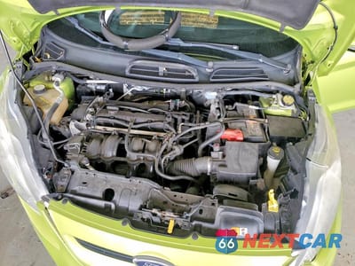 Zdjęcie 11 z 12 samochodu: 2013 FORD FIESTA TITANIUM VIN:3FADP4FJXDM153949 - miniatura