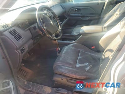 Zdjęcie 7 z 13 samochodu: 2003 HONDA PILOT EXL VIN:2HKYF18603H500294 - miniatura