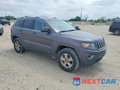 Czwarte zdjęcie samochodu z boku: 2014 JEEP GRAND CHEROKEE LAREDO VIN:1C4RJFAG4EC210464 - miniatura