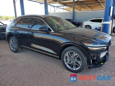 Czwarte zdjęcie samochodu z boku: 2024 GENESIS GV70 2.5T STANDARD VIN:5NMMADTBXRH016335 - miniatura
