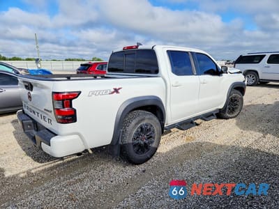 Trzecie zdjęcie samochodu z tyłu: 2022 NISSAN FRONTIER PRO-X VIN:1N6ED1EJ9NN678772 - miniatura