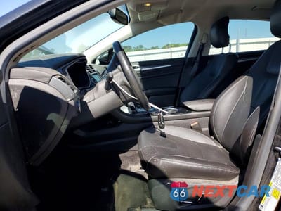 Zdjęcie 7 z 11 samochodu: 2013 FORD FUSION TITANIUM PHEV VIN:3FA6P0SU3DR332144 - miniatura