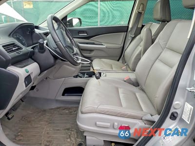 Zdjęcie 7 z 11 samochodu: 2012 HONDA CR-V EXL VIN:JHLRM4H7XCC010433 - miniatura