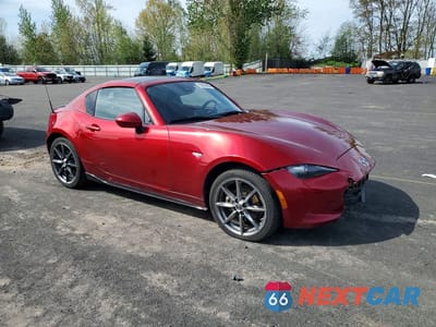 Czwarte zdjęcie samochodu z boku: 2020 MAZDA MX-5 MIATA GRAND TOURING VIN:JM1NDAM77L0411942 - miniatura