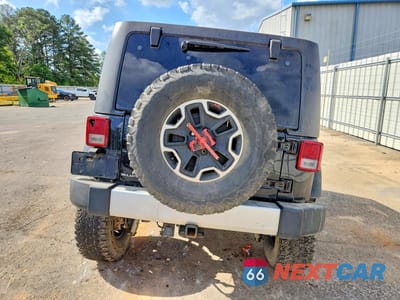 Zdjęcie 6 z 14 samochodu: 2014 JEEP WRANGLER UNLIMITED SAHARA VIN:1C4BJWEG9EL321555 - miniatura