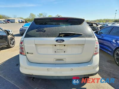Zdjęcie 6 z 13 samochodu: 2010 FORD EDGE SE VIN:2FMDK3GC2ABB38745 - miniatura