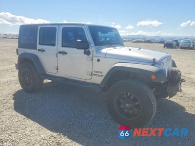 Czwarte zdjęcie samochodu z boku: 2012 JEEP WRANGLER UNLIMITED SPORT VIN:1C4BJWDG6CL215045 - miniatura