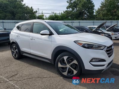 Czwarte zdjęcie samochodu z boku: 2017 HYUNDAI TUCSON SPORT VIN:KM8J3CA27HU592588 - miniatura