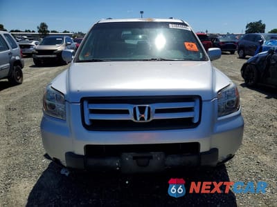 Piąte zdjęcie samochodu w środku: 2007 HONDA PILOT EXL VIN:5FNYF18577B011189 - miniatura