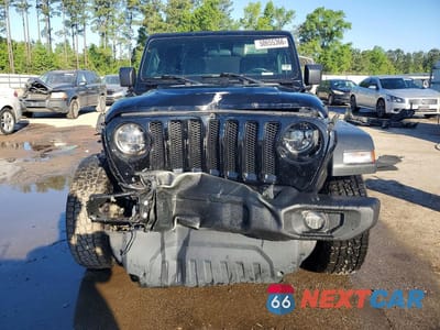 Piąte zdjęcie samochodu w środku: 2020 JEEP WRANGLER UNLIMITED SPORT VIN:1C4HJXDN4LW268632 - miniatura
