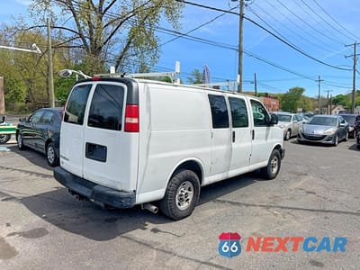 Czwarte zdjęcie samochodu z boku: 2013 GMC SAVANA G2500 VIN:1GTW7FCB6D1180204 - miniatura