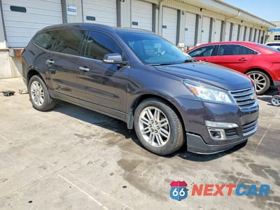 Czwarte zdjęcie samochodu z boku: 2014 CHEVROLET TRAVERSE LT VIN:1GNKRGKD7EJ239268 - miniatura