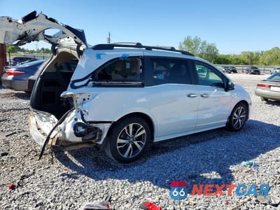 Trzecie zdjęcie samochodu z tyłu: 2021 HONDA ODYSSEY TOURING VIN:5FNRL6H8XMB042310 - miniatura