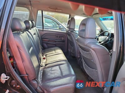 Zdjęcie 10 z 11 samochodu: 2004 HONDA PILOT EXL VIN:2HKYF187X4H605001 - miniatura