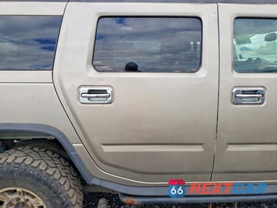 Zdjęcie 11 z 13 samochodu: 2004 HUMMER H2 VIN:5GRGN23U64H118618 - miniatura