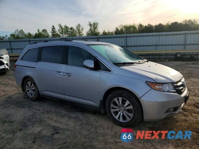 Czwarte zdjęcie samochodu z boku: 2014 HONDA ODYSSEY EXL VIN:5FNRL5H69EB125673 - miniatura