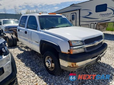 Czwarte zdjęcie samochodu z boku: 2003 CHEV SILVERADO K3500 VIN:1GCJK33G23F106122 - miniatura