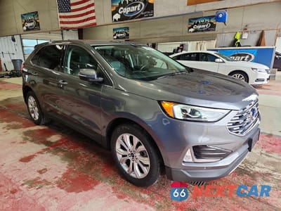 Czwarte zdjęcie samochodu z boku: 2022 FORD EDGE TITANIUM VIN:2FMPK4K94NBA63969 - miniatura