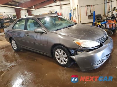 Czwarte zdjęcie samochodu z boku: 2003 TOYOTA CAMRY LE V6 VIN:4T1BF32K13U552171 - miniatura