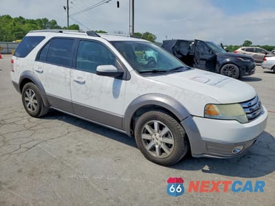 Czwarte zdjęcie samochodu z boku: 2008 FORD TAURUS X SEL VIN:1FMDK05W38GA36790 - miniatura