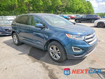 Czwarte zdjęcie samochodu z boku: 2016 FORD EDGE SEL VIN:2FMPK3J99GBC04064 - miniatura