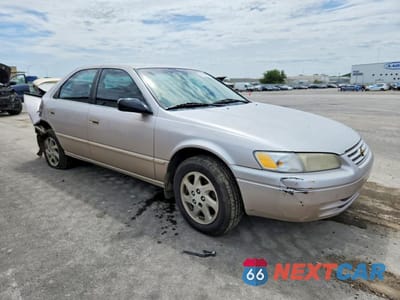Czwarte zdjęcie samochodu z boku: 1997 TOYOTA CAMRY XLE V6 VIN:4T1BF22KXVU902913 - miniatura