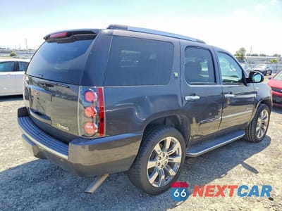 Trzecie zdjęcie samochodu z tyłu: 2010 GMC YUKON DENALI HYBRID VIN:1GKUKGEJ2AR208517 - miniatura