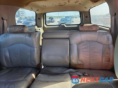 Zdjęcie 10 z 13 samochodu: 2003 GMC YUKON XL C1500 VIN:1GKEC16Z13J178138 - miniatura
