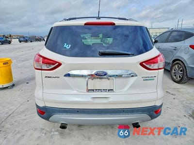 Zdjęcie 6 z 13 samochodu: 2016 FORD ESCAPE TITANIUM VIN:1FMCU0J93GUC78341 - miniatura