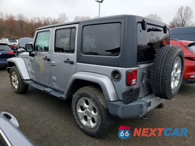 Drugie zdjęcie samochodu z przodu: 2013 JEEP WRANGLER UNLIMITED SAHARA VIN:1C4HJWEG8DL571605 - miniatura