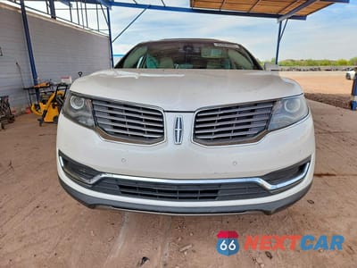 Piąte zdjęcie samochodu w środku: 2016 LINCOLN MKX RESERVE VIN:2LMTJ6LR3GBL52344 - miniatura