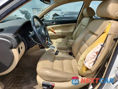 Zdjęcie 7 z 12 samochodu: 1999 VOLKSWAGEN PASSAT GLX VIN:WVWPD63B0XE491640 - miniatura