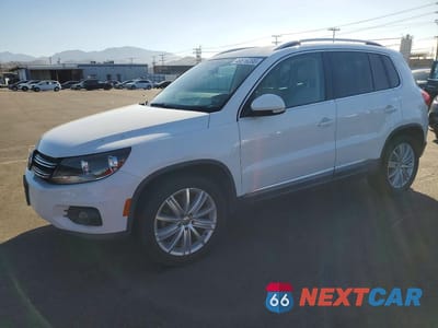 2014 VOLKSWAGEN TIGUAN S WVGAV3AX4EW556248 - główne zdjęcie licytacji z USA - miniatura