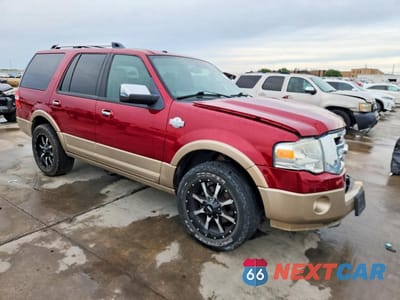 Czwarte zdjęcie samochodu z boku: 2014 FORD EXPEDITION XLT VIN:1FMJU1H55EEF10655 - miniatura