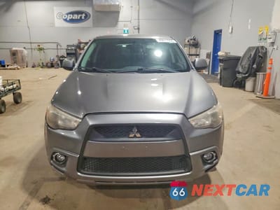 Piąte zdjęcie samochodu w środku: 2012 MITSUBISHI RVR SE VIN:JA4AH3AU1CZ602965 - miniatura