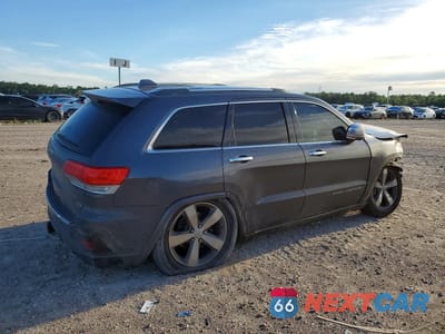Trzecie zdjęcie samochodu z tyłu: 2014 JEEP GRAND CHEROKEE OVERLAND VIN:1C4RJFCM2EC329679 - miniatura