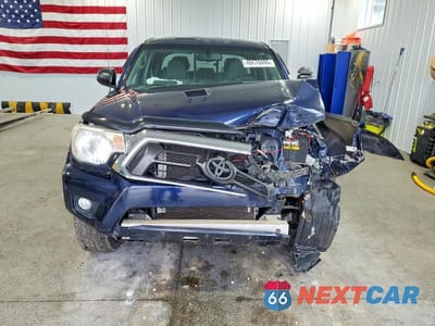 Piąte zdjęcie samochodu w środku: 2013 TOYOTA TACOMA VIN:3TMLU4EN2DM114808 - miniatura