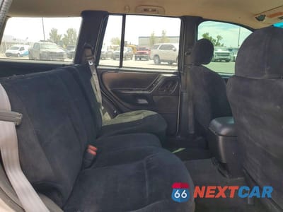 Zdjęcie 11 z 13 samochodu: 1999 JEEP GRAND CHEROKEE LAREDO VIN:1J4GW58S1XC564663 - miniatura
