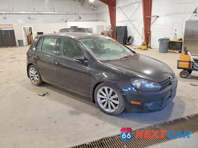 Czwarte zdjęcie samochodu z boku: 2014 VOLKSWAGEN GOLF VIN:WVWNM7AJ3EW007877 - miniatura