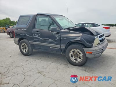 Czwarte zdjęcie samochodu z boku: 2003 CHEV TRACKER VIN:2CNBE18C136908804 - miniatura