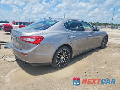 Trzecie zdjęcie samochodu z tyłu: 2015 MASERATI GHIBLI S VIN:ZAM57RTAXF1131655 - miniatura