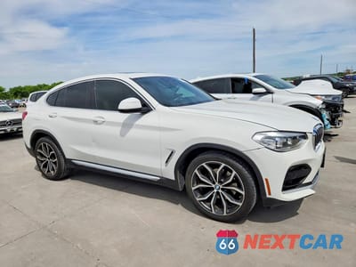 Czwarte zdjęcie samochodu z boku: 2021 BMW X4 XDRIVE30I VIN:5UX2V1C03M9H38079 - miniatura