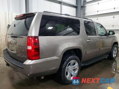 Trzecie zdjęcie samochodu z tyłu: 2011 CHEVROLET SUBURBAN K1500 LT VIN:1GNSKJE33BR334511 - miniatura