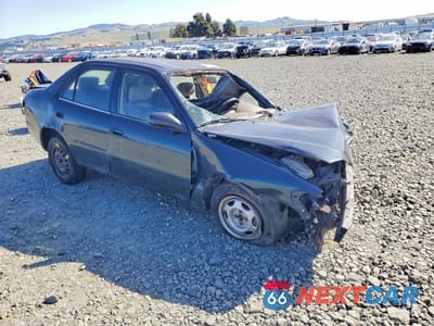 Czwarte zdjęcie samochodu z boku: 1999 TOYOTA COROLLA VE VIN:1NXBR12E4XZ236713 - miniatura