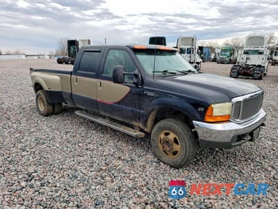 Czwarte zdjęcie samochodu z boku: 2000 FORD F350 SUPER DUTY VIN:1FTWW33S2YEA29134 - miniatura