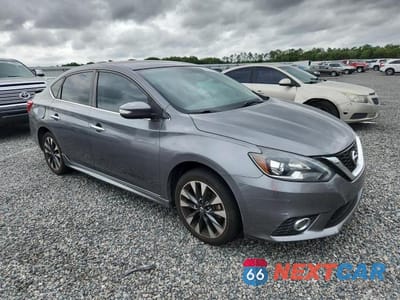 Czwarte zdjęcie samochodu z boku: 2019 NISSAN SENTRA SR VIN:3N1AB7AP9KY321470 - miniatura